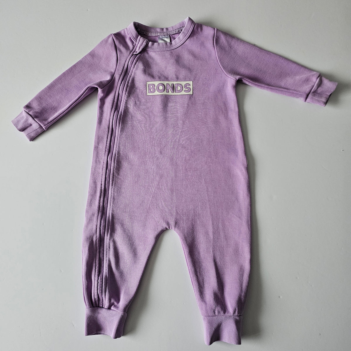 Bonds Tech Zip Onsie (minor flaw) - Size 6-12m