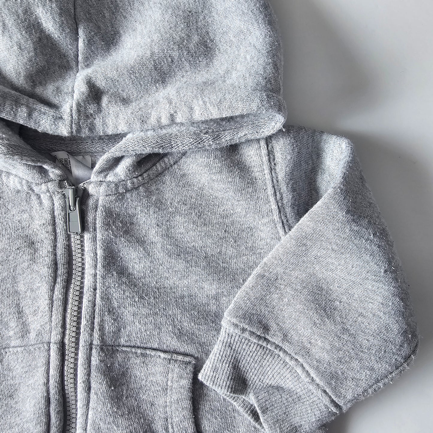 Bonds Zip Hoodie (minor flaw)  - Size 3-6m